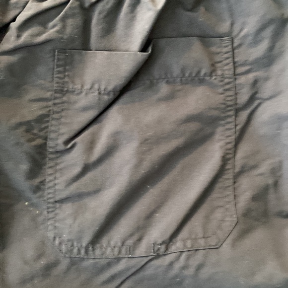 A Lacoste men’s quick-dry swim shorts with built in mesh lining. - Picture 8 of 8